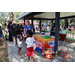United Way Suncoast person talking with kids at the Spring Family Picnic event in Jordan Park on March 26, 2024.