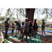 Children preparing for tree climb at the Spring Family Picnic event in Jordan Park on March 26, 2024.