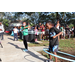 Children hula hooping outside at the Spring Family Picnic event in Jordan Park on March 26, 2024.