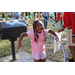 Young girl in pink wearing pink shirt at the Spring Family Picnic event in Jordan Park on March 26, 2024.