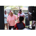 Woman wearing yellow sunglasses smiling at the Spring Family Picnic event in Jordan Park on March 26, 2024.