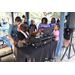 DJ Dondy and children at the Spring Family Picnic event in Jordan Park on March 26, 2024.