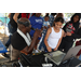 DJ Dondy and child wearing white shirt at the Spring Family Picnic event in Jordan Park on March 26, 2024.