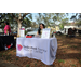 Dedicated Senior Medical Center table at Spring Family Picnic event in Jordan Park on March 26, 2024.