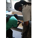 St. Petersburg Housing Authority (SPHA) team working on kitchen cabinets inside Habitat for Humanity house.