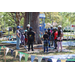 Pathfinder Outdoor Education preparing tree climb experience at Spring Family Picnic in Jordan Park.