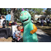 Great Explorations dinosaur mascot and child at Spring Family Picnic in Jordan Park.