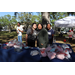 Group of people at table at Spring Family Picnic in Jordan Park.