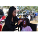 Child getting their face painted at Spring Family Picnic in Jordan Park.