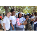 Group of people with one of them holding a balloon creation at Spring Family Picnic in Jordan Park.