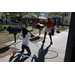 Two girls hula-hooping on sidewalk at Spring Family Picnic in Jordan Park.