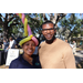 Woman wearing balloon hat and man wearing tan sweater at Spring Family Picnic in Jordan Park.