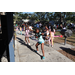 Youth hula-hooping near grill at Spring Family Picnic in Jordan Park.