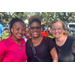  Three women at Back to School Event in Jordan Park 2025. 