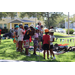  Children wearing helmets getting ready to tree climb at Back to School Event in Jordan Park 2025. 