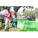  Two people in front of Humana table at Back to School Event in Jordan Park 2025. 