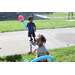  Two young children with balloons at Back to School Event in Jordan Park 2025. 