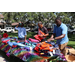  People at backpack table at Back to School Event in Jordan Park 2025. 