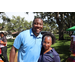  Two SPHA team members at Back to School Event in Jordan Park with green grass in the background. 