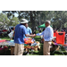  Mr. Lundy shaking hands with a SPHA team member at Back to School Event in Jordan Park 2025. 