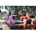  Two women seated at a bench at Back to School Event in Jordan Park 2025. 