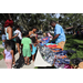  Group of people at backpack table Back to School Event in Jordan Park 2025. 