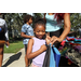  Child wearing a lavender shirt at Back to School Event in Jordan Park 2025. 