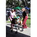  Two people dancing at Back to School Event in Jordan Park 2025. 