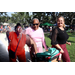  Three people at Back to School Event in Jordan Park with green grass in the background. 