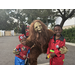  Man dressed as Bigfoot and a two children 
