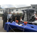  St. Petersburg police officers standing by Halloween decorated table and decorated trunk. 