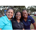  Three SPHA team members at the Very Merry Holiday Party in Jordan Park. 