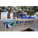  The Bay Area Legal Services table at the Very Merry Holiday Party in Jordan Park. 