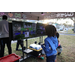  Children playing video games at the Very Merry Holiday Party in Jordan Park. 
