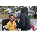  Face Painting Brittni painting a child's face at the Very Merry Holiday Party in Jordan Park. 