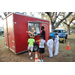  People getting ice treats at the Very Merry Holiday Party in Jordan Park. 