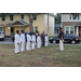  Martial arts teacher and students standing on grass in Jordan Park. 