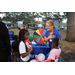  Children and a BayCare team member at the Very Merry Holiday Party in Jordan Park. 