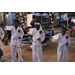  Three young martial arts students at the Very Merry Holiday Party in Jordan Park. 