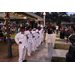  Martial arts students and teacher standing on sidewalk in Jordan Park. 