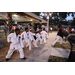  Martial arts teacher and young students at the Very Merry Holiday Party in Jordan Park. 