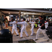  Martial arts demonstration with holiday lights in the background. 