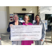  Carolyn Avington, SPHA Vice President of Finance / CFO, U.S. Rep. Kathy Castor, and Danielle Thomas, SPHA Sr. Vice President / COO holding a big check. 