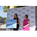  Elodie Dorso, CEO and President of Evara Health, speaking at a microphone, with U.S. Rep. Kathy Castor standing next to her. 
