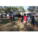 Youth getting ready for a tug of war game with a SPHA team member standing in the middle. 