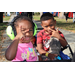  Two children at the Spring Family Picnic event in Jordan Park on March 10, 2026. 