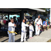  Youth martial arts students with right arm extended at the Spring Family Picnic event in Jordan Park on March 10, 2026. 