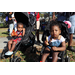  Two children eating pizza at the Spring Family Picnic event in Jordan Park on March 10, 2026 