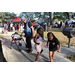  A senior SPHA resident dancing with two young residents at the Spring Family Picnic event in Jordan Park. 